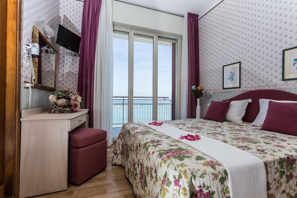 Hotel Sporting Cesenatico Pokoj fotografie